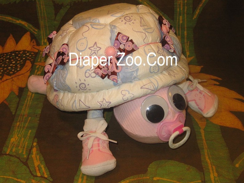 Learn how to make Scooter the Diaper Turtle. GR8 for baby nursery. Diaper cake keepsake image 2