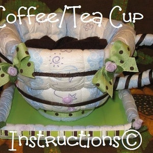 ISTRUZIONI per una tazza da caffè, una tazza da tè con torta di pannolini. Fai da te. Regalo perfetto per neonati. Realizzala, riempila di dolcetti per neonati/mamme! OTTIMA per conservare.