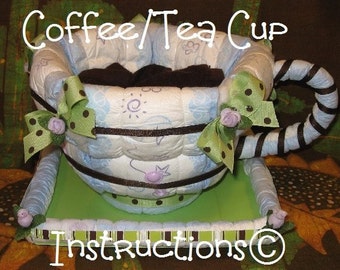 INSTRUCTIONS 4 a diaper cake Coffee/Tea Cup. GR8 new baby gift. Make it and fill it up with baby/mommy goodies