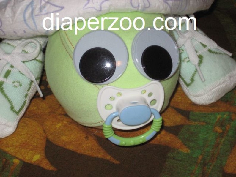 Learn how to make Scooter the Diaper Turtle. GR8 for baby nursery. Diaper cake keepsake image 4