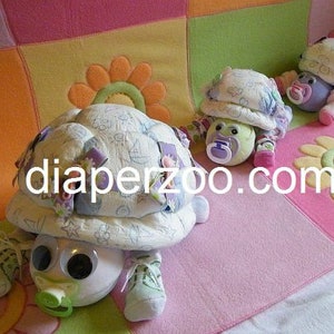 Learn how to make Scooter the Diaper Turtle. GR8 for baby nursery. Diaper cake keepsake image 5