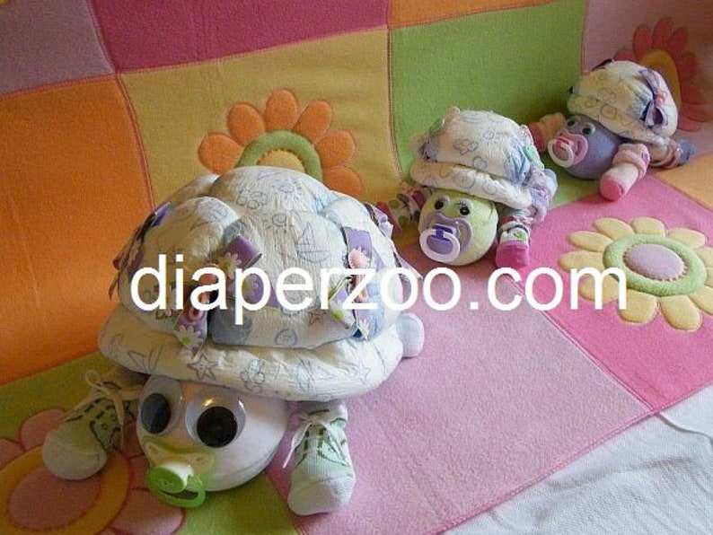 Learn how to make Scooter the Diaper Turtle. GR8 for baby nursery. Diaper cake keepsake image 5