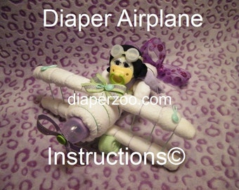 DIAPER AIRPLANE e-book INSTRUCTIONS. Completely made from diapers, washcloths, bottle, etc. Easy 2 follow guide.