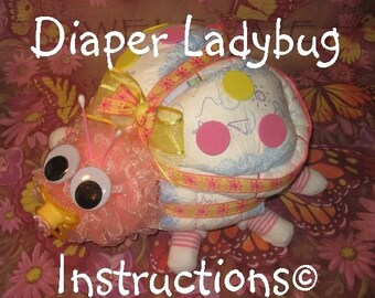 Learn to make a Ladybug from diapers, socks, etc. diaper cake keepsake. GR8 baby shower gift