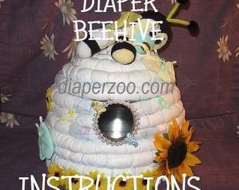 INSTRUCTIONS How to make a BEEHIVE from diapers. Great Gender Reveal idea; &quot;What&#39;s it gonna BEE?&quot; Baby shower centerpiece, keepsake, storage