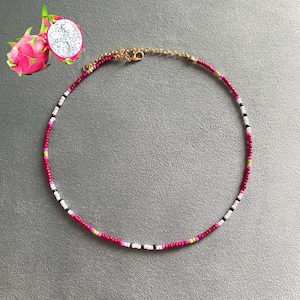 dragon fruit beaded necklace | tropical-inspired choker with pink, green, white, & black seed beads
