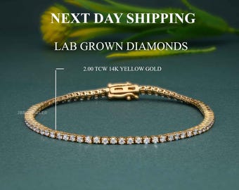 May include: A 2.00 TCW 14K yellow gold tennis bracelet with a row of small round diamonds. The bracelet is on a green background with the text "NEXT DAY SHIPPING" and "LAB GROWN DIAMONDS" above the bracelet.