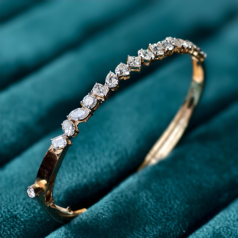 gold bangle set with multi-shape lab diamonds in gold