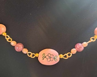 Mauve floral necklace Bh840