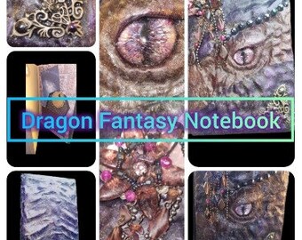 May include: A handmade notebook with a dragon-themed cover. The cover features a large, iridescent purple eye, scales, and intricate details in gold and brown. The notebook is titled "Dragon Fantasy Notebook".