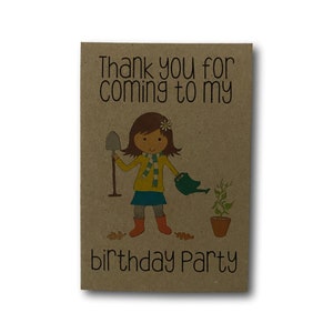May include: Thank you for coming to my birthday party card featuring a cartoon illustration of a girl holding a spade and watering can. The card is brown with black text.