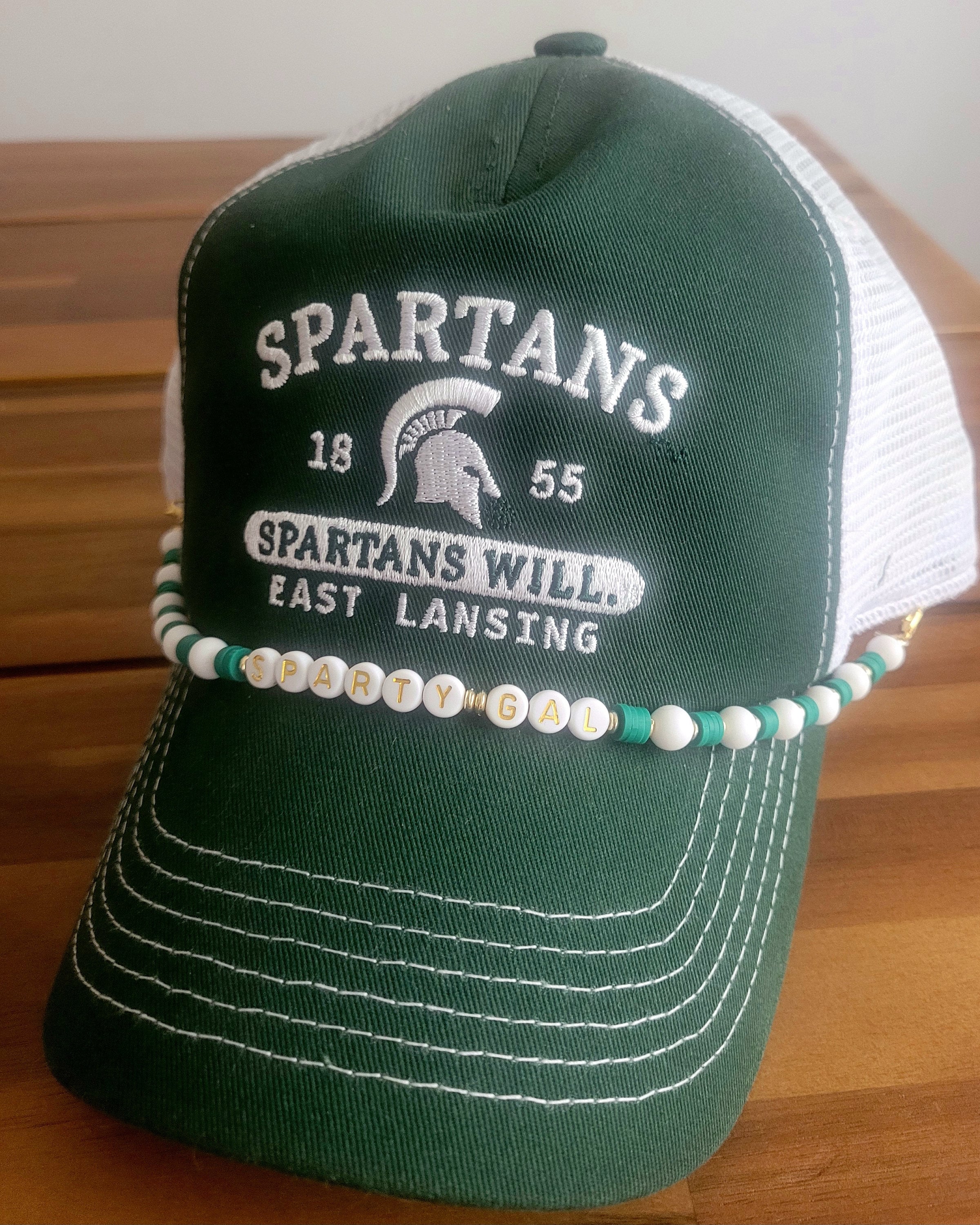 Beaded sports team saying trucker hat chain