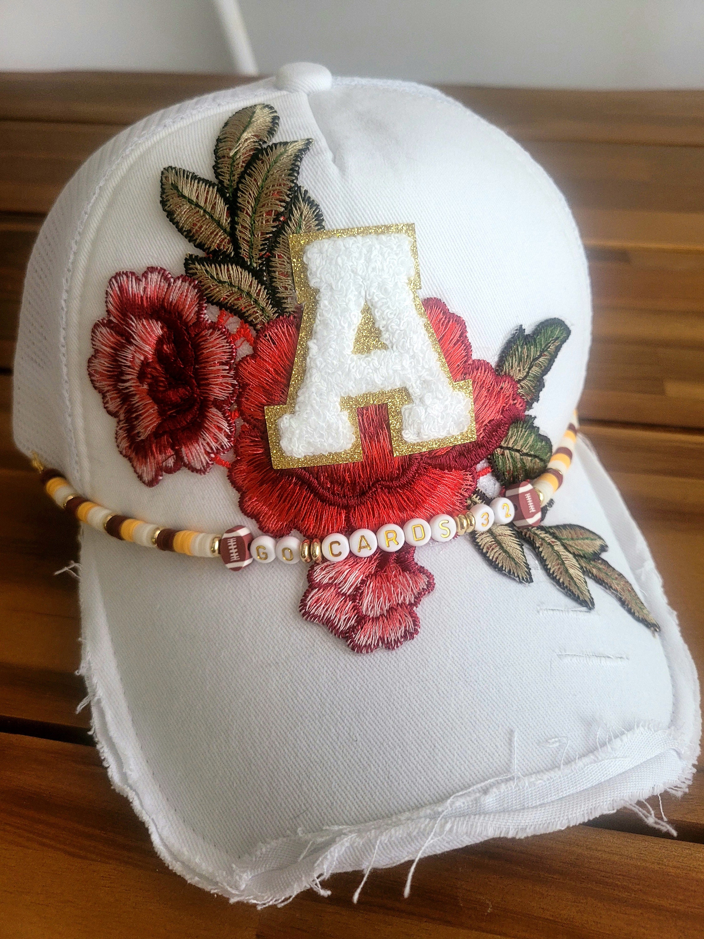 Beaded sports team saying trucker hat chain