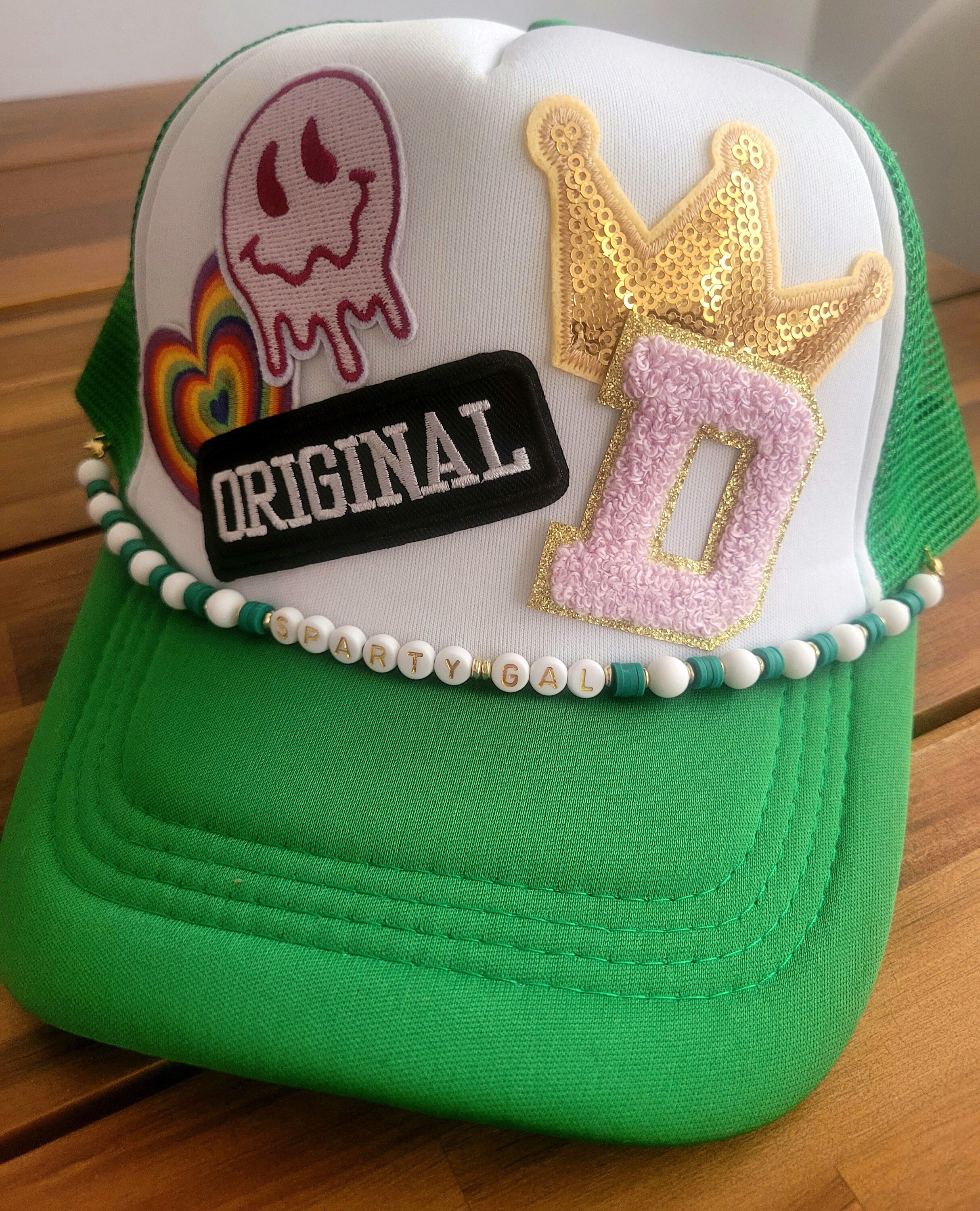 Beaded sports team saying trucker hat chain