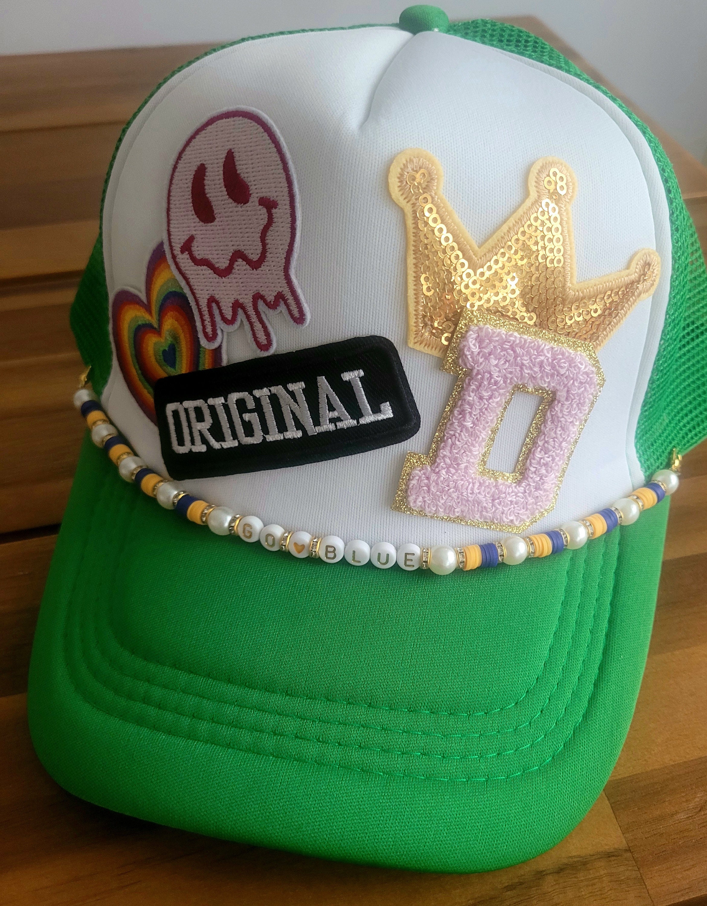 Beaded sports team saying trucker hat chain