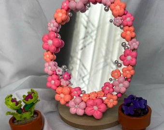 mirror with pink clay flowers