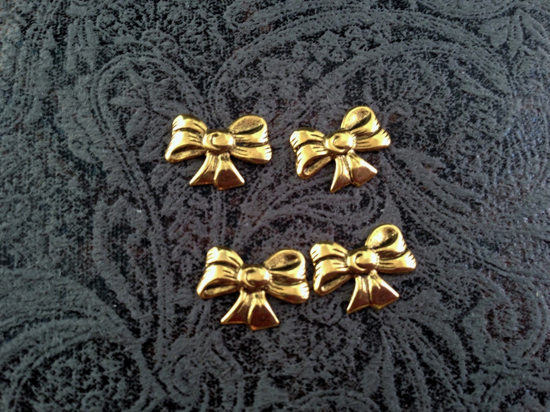 Raw Shiny Brass Bow Finding Group of 4 - Etsy