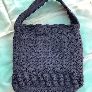 Monedero vintage de cuerda negra de los años 40 con asa superior