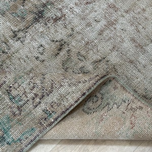 Faded Oushak Rug: 4.7x8.7 ft. Vintage Turkish Wool Rug