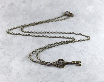 Tiny Skeleton Key Dark Academia Necklace with Antiqued Brass