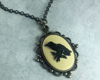 Ivory and Black Raven Whimsigoth Cameo Necklace with Antiqued Brass
