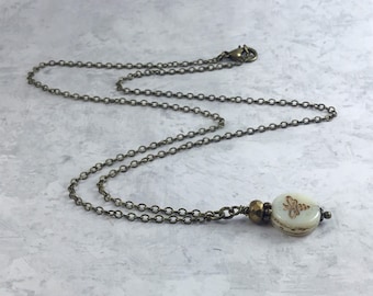 Ivory Bee Cottagecore Necklace with Antiqued Brass
