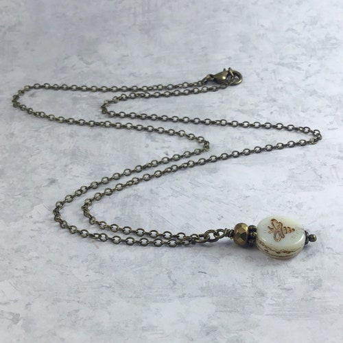Ivory Bee Cottagecore Necklace with Antiqued Brass