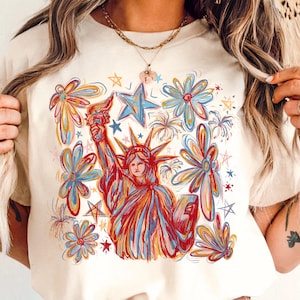 4th of July Comfort Colors Shirt, Hand Drawn Statue of Liberty Tee, Patriotic USA Fireworks Floral Graphic T-Shirt for Women Gift Idea