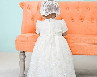 White lace baby dress with delicate lace trim. Special occasion dress made of high quality white lace - short sleeves, rounded neckline