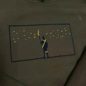 Torchbearer inspired embroidered sweatshirt