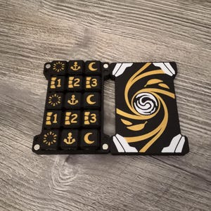Scatola con 15 dadi D6 16mm formato carta – Altered TCG