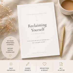 May include: A white guided journal titled Reclaiming Yourself: A 30-Day Ayurvedic Journey Home, featuring a gold pen and a 44-page printable journal badge. The cover includes the text: For the woman who wears every hat but her own—here is your gentle way back.