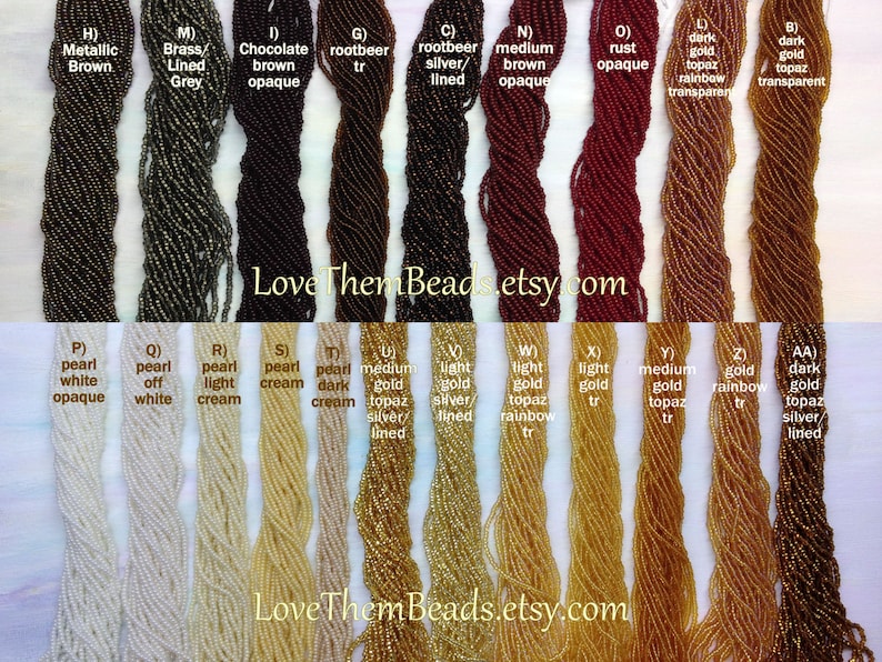 May include: A variety of seed beads in different colors and finishes, including metallic brown, brass lined grey, chocolate brown opaque, rootbeer, rootbeer silver lined, medium brown opaque, rust opaque, dark gold topaz rainbow transparent, dark gold topaz transparent, pearl white opaque, pearl off white, pearl light cream, pearl cream, pearl dark cream, medium gold topaz silver lined, light gold silver lined, light gold topaz rainbow, light gold, medium gold topaz, gold rainbow, dark gold topaz silver lined. The text "Love Them Beads.etsy.com" appears twice on the image.