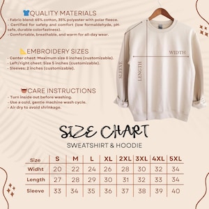 May include: A cream-colored sweatshirt hanging on a wooden hanger, with a size chart and care instructions. The chart shows measurements for width, length, and sleeve sizes, ranging from S to 5XL. The image also includes details about the fabric blend and embroidery sizes.