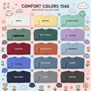 May include: A Comfort Colors 1566 sweatshirt color chart displaying fifteen folded crewneck sweatshirts in various shades including white, butter, chalky mint, light green, blue spruce, orchid, crimson, terracotta, chambray, flo blue, blue jean, denim, true navy, grey, and pepper.