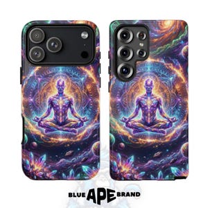 May include: Two phone cases with a vibrant design. Each case features a meditating figure in a lotus position, surrounded by a cosmic background with swirling colors of purple, blue, and gold. The cases have a black camera cutout and the text "BLUE APE BRAND".