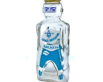 Astronaut Space Warrior Galaxy Glass Syrup Bottles Vintage Spaceman Glass Bank Yellow Interplanetary Commander New Old Stock