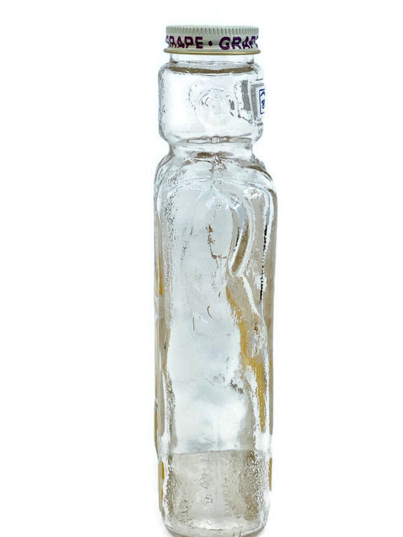 Astronaut Space Warrior Galaxy Glass Syrup Bottles Vintage Spaceman Glass Bank Yellow Interplanetary Commander New Old Stock