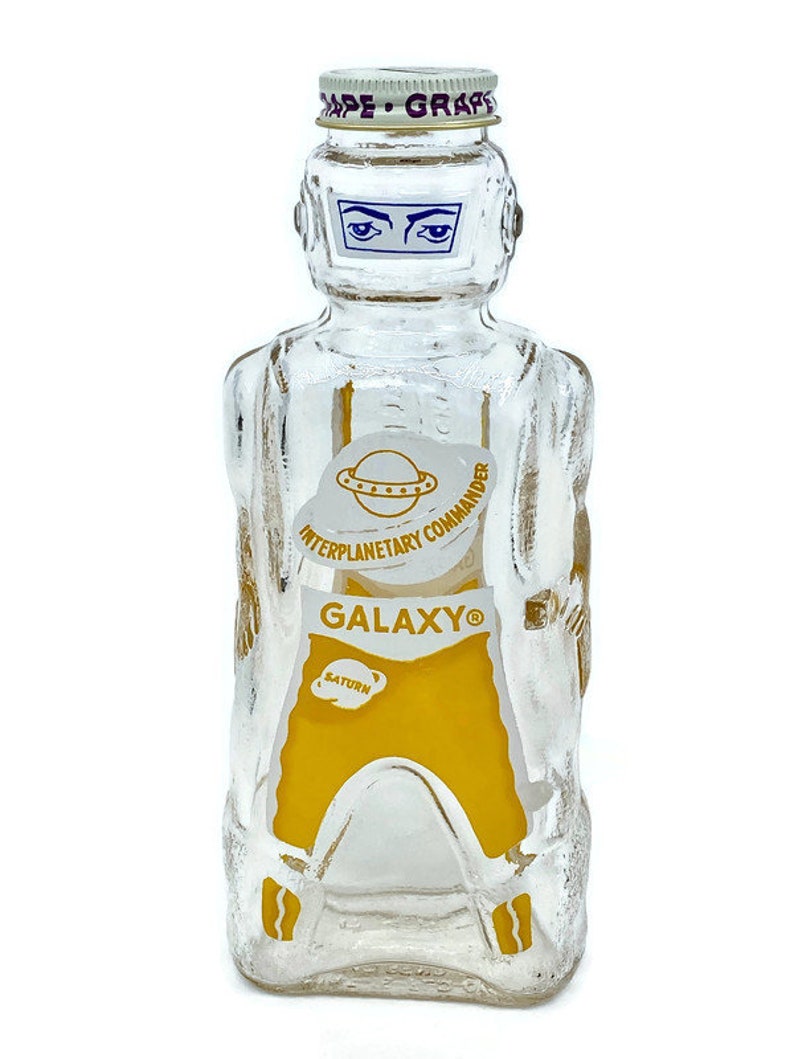 Astronaut Space Warrior Galaxy Glass Syrup Bottles Vintage Spaceman Glass Bank Yellow Interplanetary Commander New Old Stock