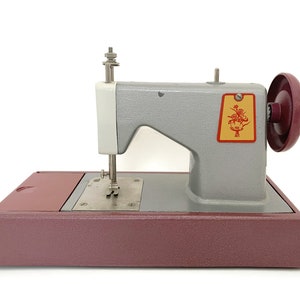Vintage Toy Sewing Machine with Original Box and Instruction Sheet