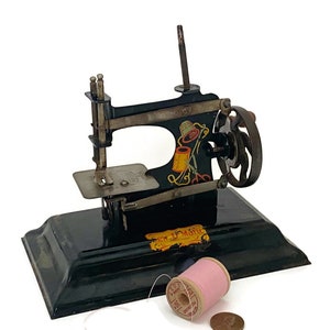 Vintage Toy Sewing Machine - Casige Sew O Matic with Needle and Thread Graphics