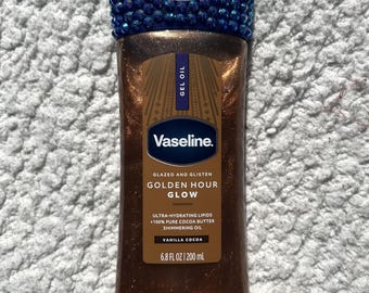 Zauberhaftes Vaseline Golden Hour Glow Körperöl Bling