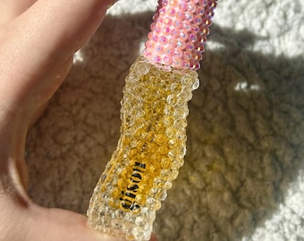 Aceite labial de miel Gisou con brillo