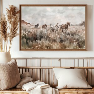 Mockup of wild horses running through a Southwestern desert landscape full of wildflowers. Printable wall art.