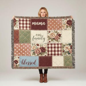 May include: A patchwork throw blanket with various patterns, including polka dots, gingham, floral prints, and quilted squares. The blanket features the words "mama", "our family", and "blessed". The edges are fringed.