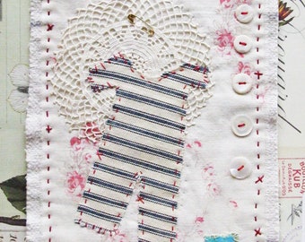 Art quilt, textile art, vintage, clothing and buttons, safety pin series