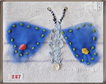 Mini art quilt, winged creature, embroidery, nature
