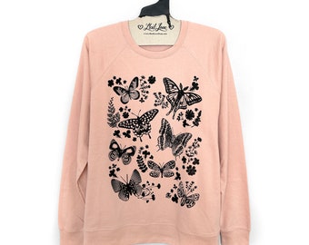 Unisex Medium - Sudadera ligera Blush French Terry Raglan con estampado de polillas y mariposas