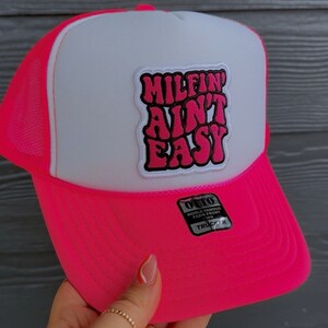 MILFin’ Ain’t Easy Neon White/ Pink Foam Front Otto Trucker Hat