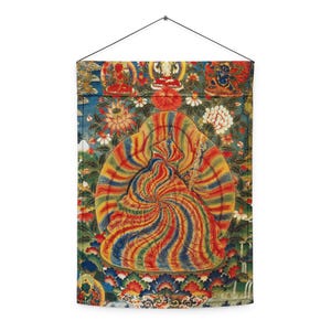 May include: A wall hanging featuring a vibrant, abstract design with a central figure in swirling red, yellow, and blue hues. The artwork is framed by floral patterns and figures, creating a colorful and detailed composition.